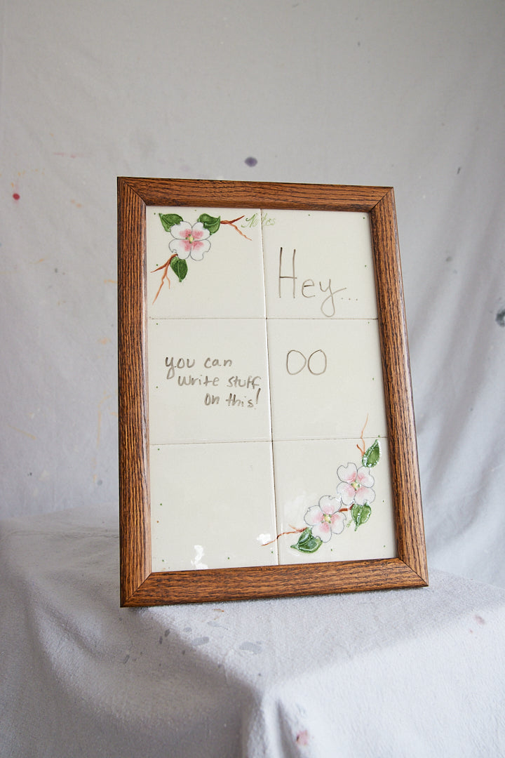 Tiled and framed "Notes" board